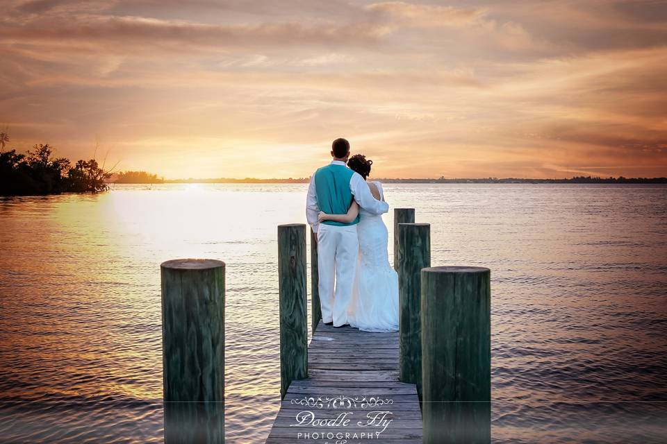 Stunning Bride & Groom  Portrait captured by Doodle Fly Photography at White Orchid at Oasis Fort Myers Florida