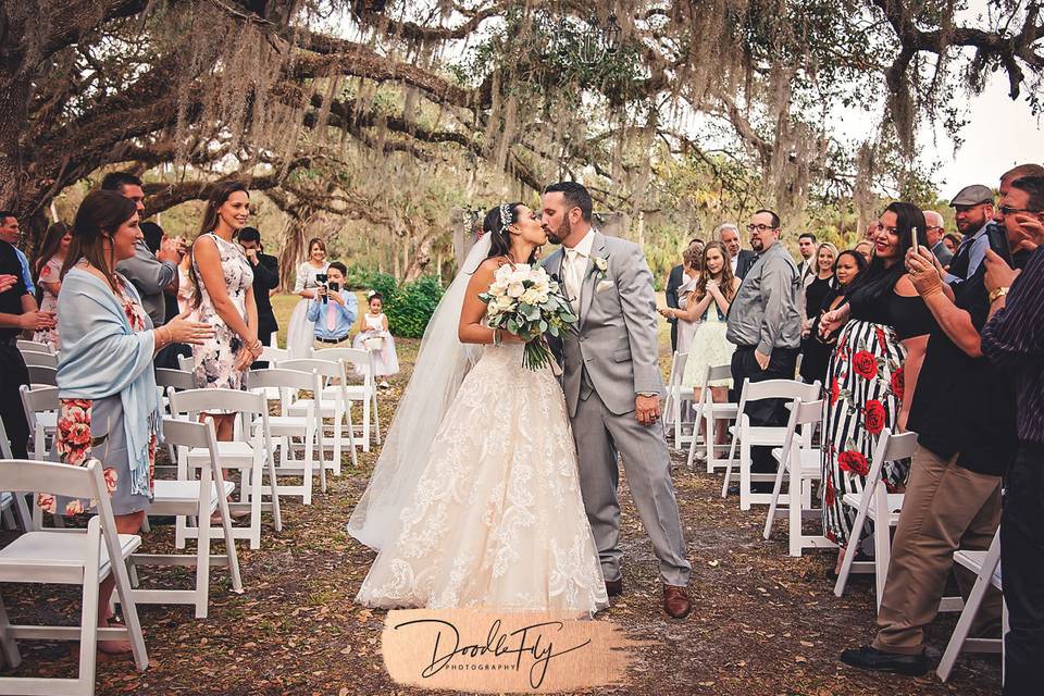 Stunning Wedding Ceremony captured by Doodle Fly Photography at Southern Waters, North Fort Myers Florida