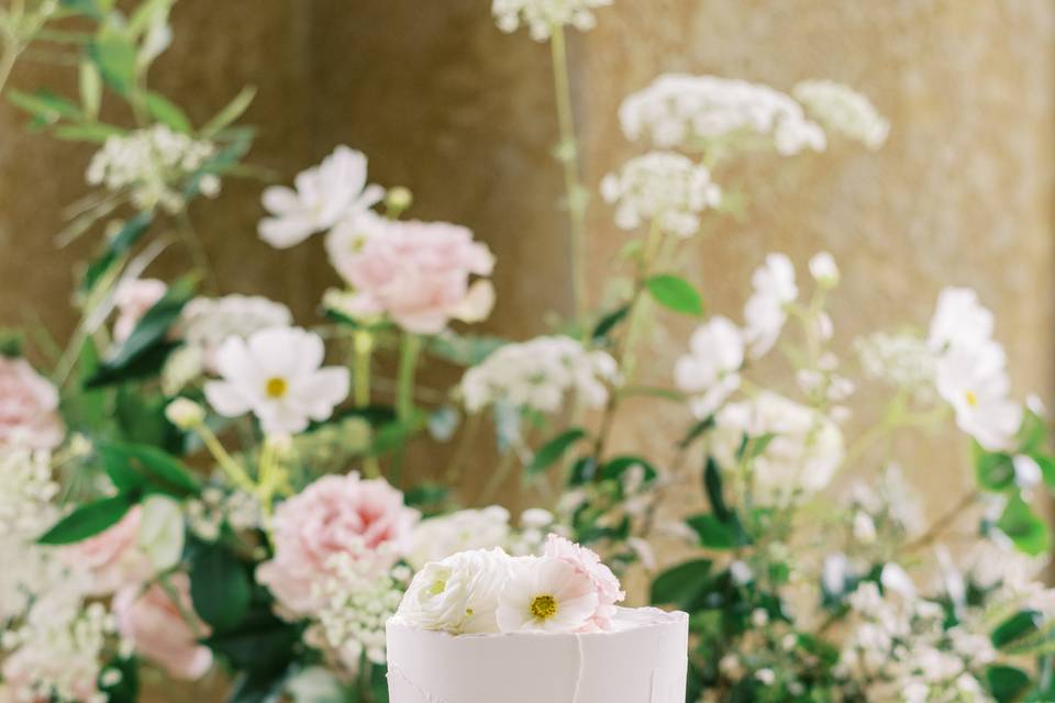 Whimsical tiered wedding cake