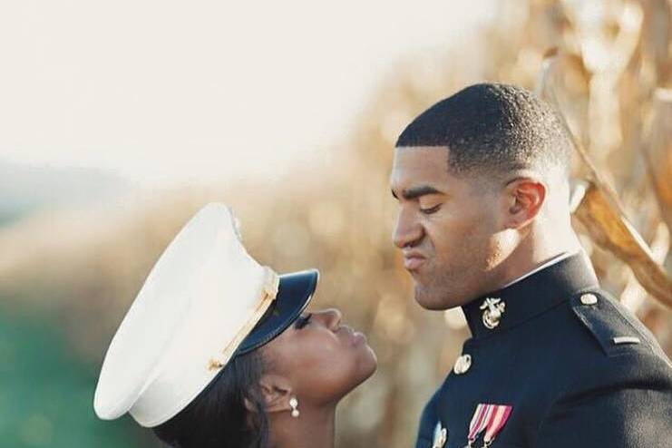 Bride wearing her groom's cap