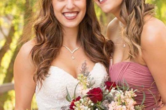 The bride with her bridesmaid