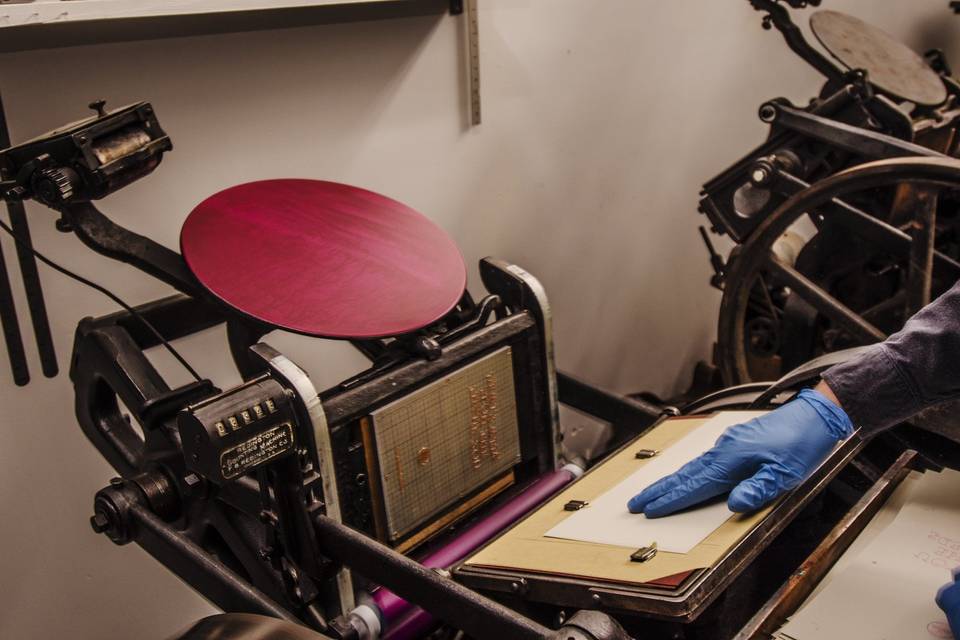 We hand print all of our letterpress goods on an antique Chandler & Price press.