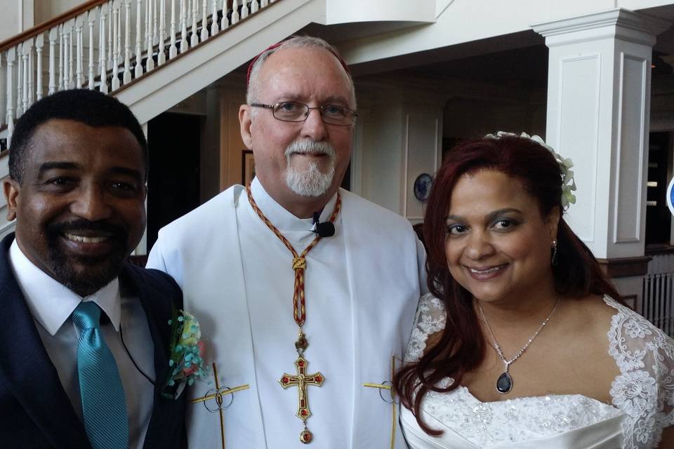 The bishop with the newlyweds