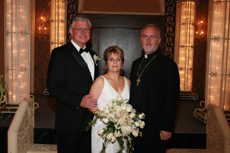 Post-ceremony photo with the newlyweds