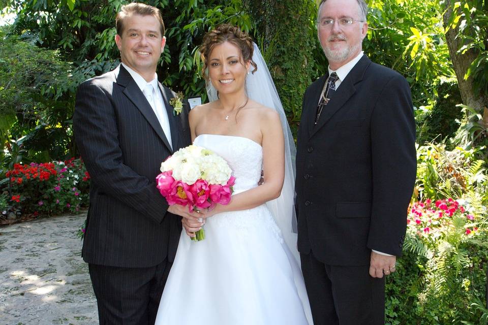 Newlyweds with the bishop