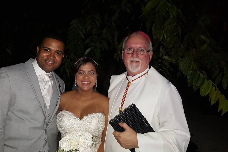 Groom and bride with the bishop