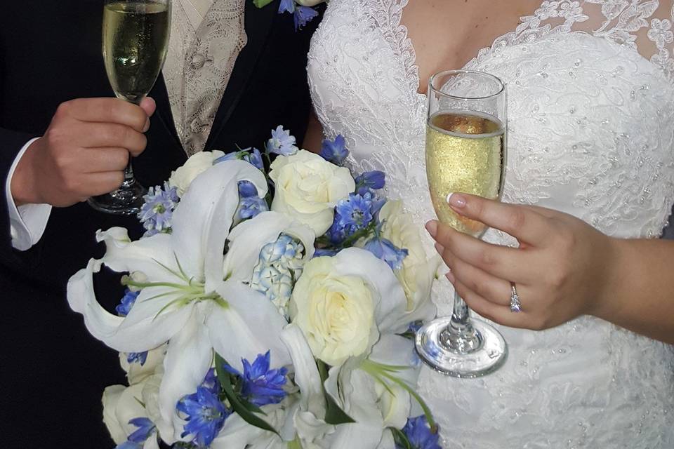 Newlyweds sharing drinks