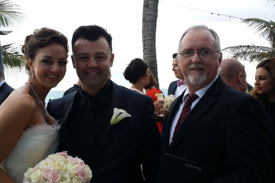 Newlyweds with the bishop