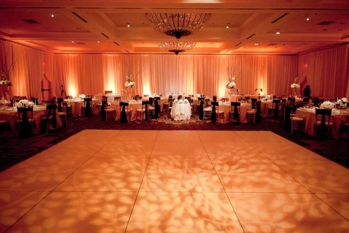 Golden gobo projection with lavender uplighting.