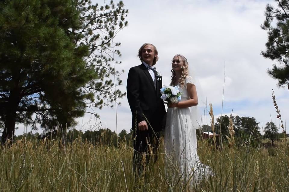 Couple in a grassy field