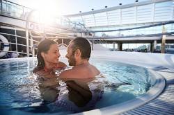 Couple in hot tub on ship
