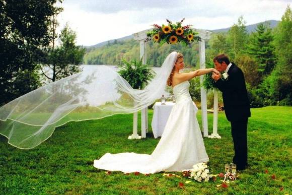 Overlooking the lake and the Appalachian Trail your guests will witness your vows and then stay on the property for the reception festivities.