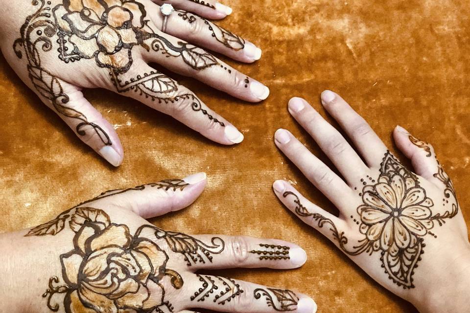 Wedding party henna'd hands