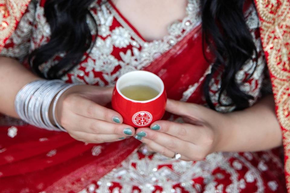 Chinese-Indian with tea cup