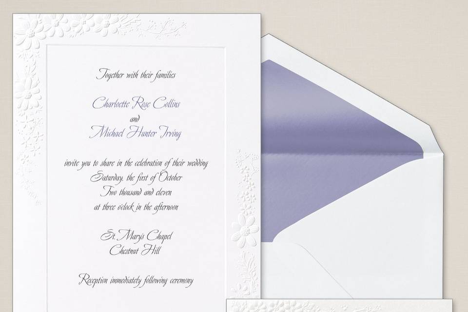 Twin Hearts - This artful pairing of two silvery hearts creates a wedding invitation of remarkable impact and style. The shimmering paper stock gives a dazzling look. Available in pearl white or shimmering silver. Coordinates with our Twin Hearts wedding accessories. Order Your Free Sample Today!