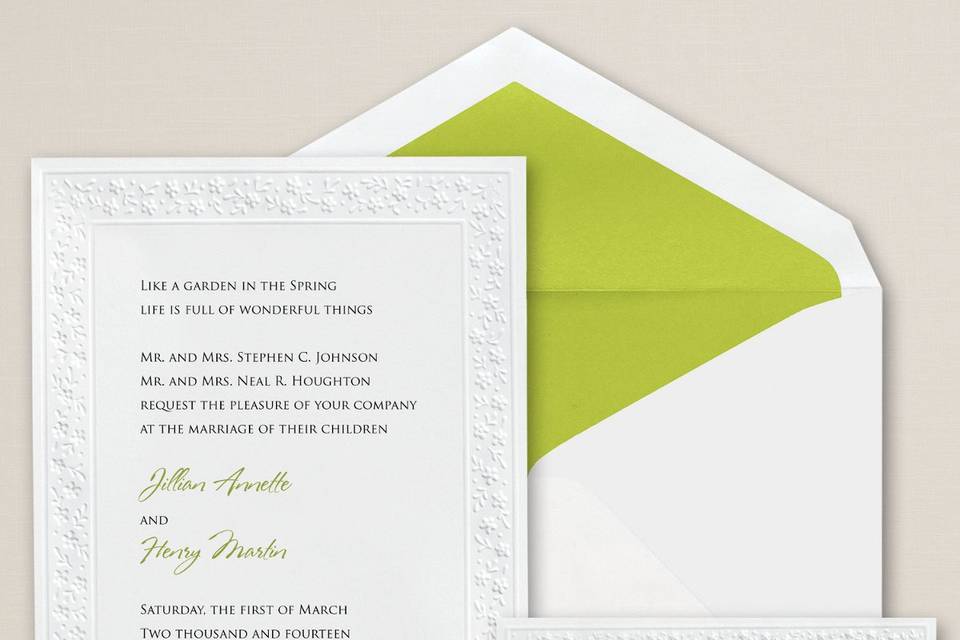 Delicate Flowers - A charming embossed floral border accentuates this non-folding, bright white card from Exclusively Weddings. Order Your Free Sample Today!