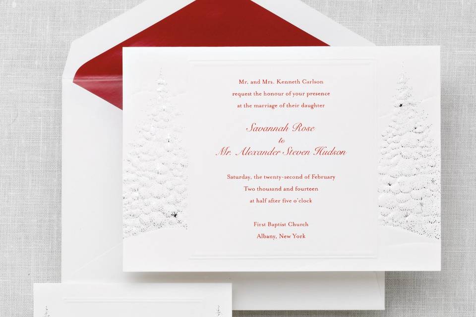Winter's Romance - Herald your holiday or winter wedding with this exquisite fold-over invitation adorned with a winter’s theme motif accented in shimmery silver. Order Your Free Sample Today!