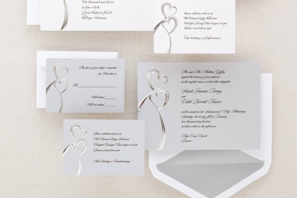 Always-Forever-Love - Synonymous with your wedding vows—always, forever, love—each word flows across the top of the wedding invitation, response card and reception card in shimmering script. Exclusively Weddings suggests a mix-and match layout for a custom presentation. This large, square invitation card is bordered with a touch of black.  Order Your Free Sample Today!