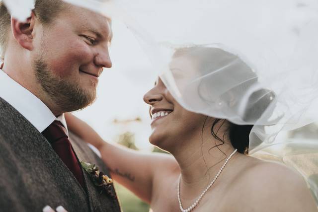 Smiles concealed by the veil