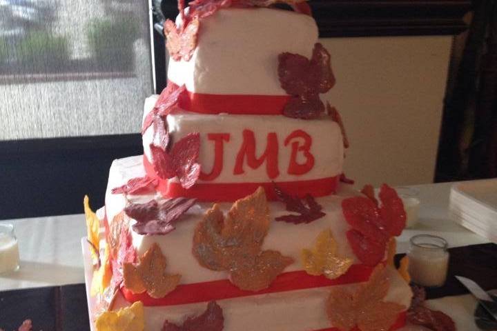 4 tier wedding cake07/11/14Flavor:-Orange and double almond marbled