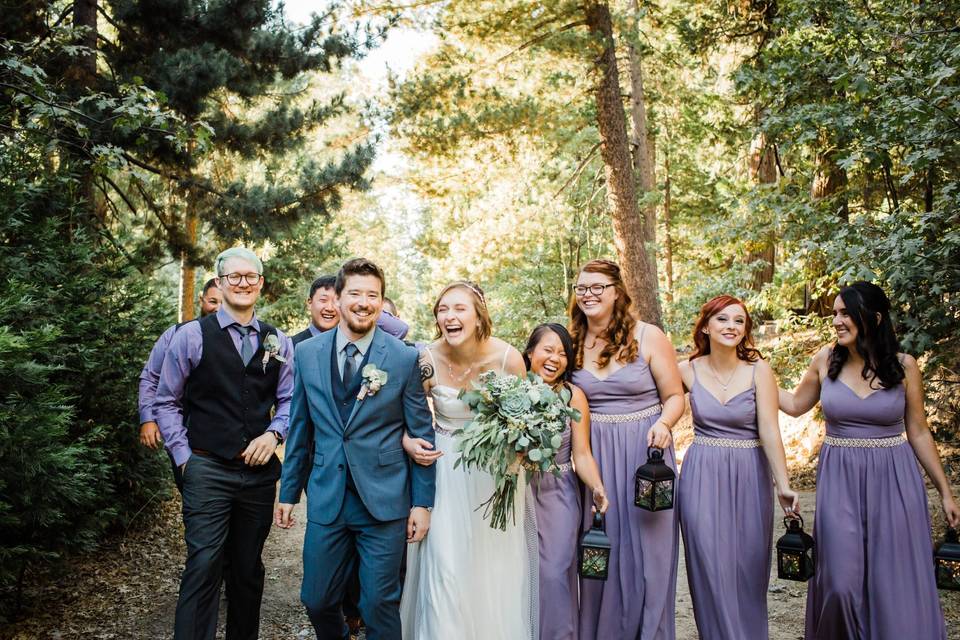 A bridal party laughing