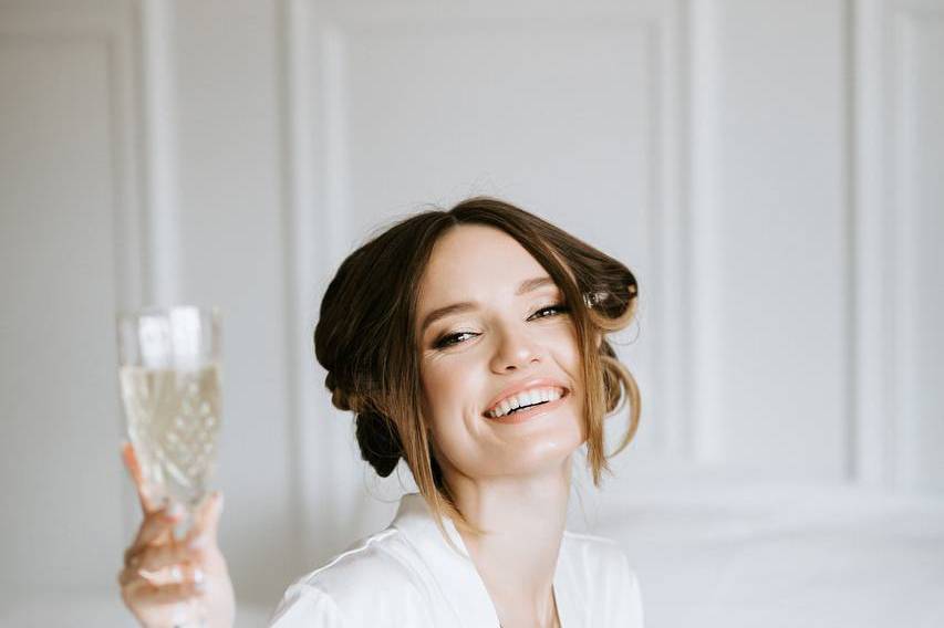 Bride during hairstyle process