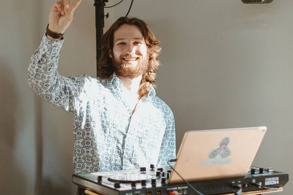 DJ waving