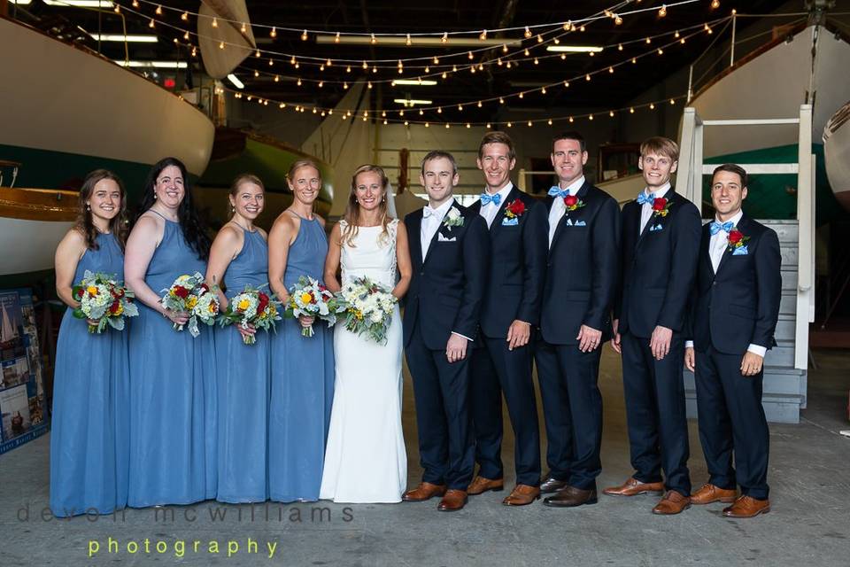 Newlyweds, bridesmaids, and groomsmen