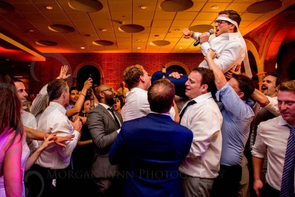 Lifting the groom