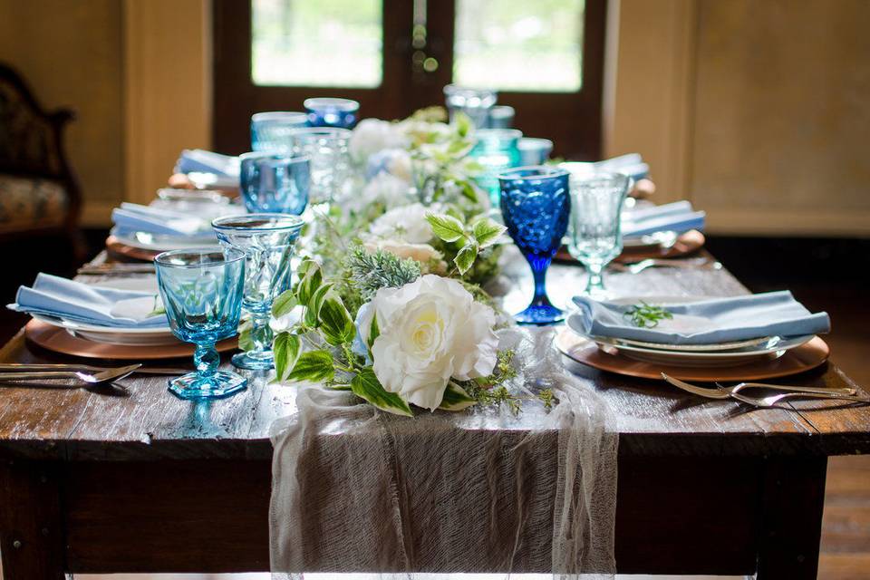 Table settings with blue goblets