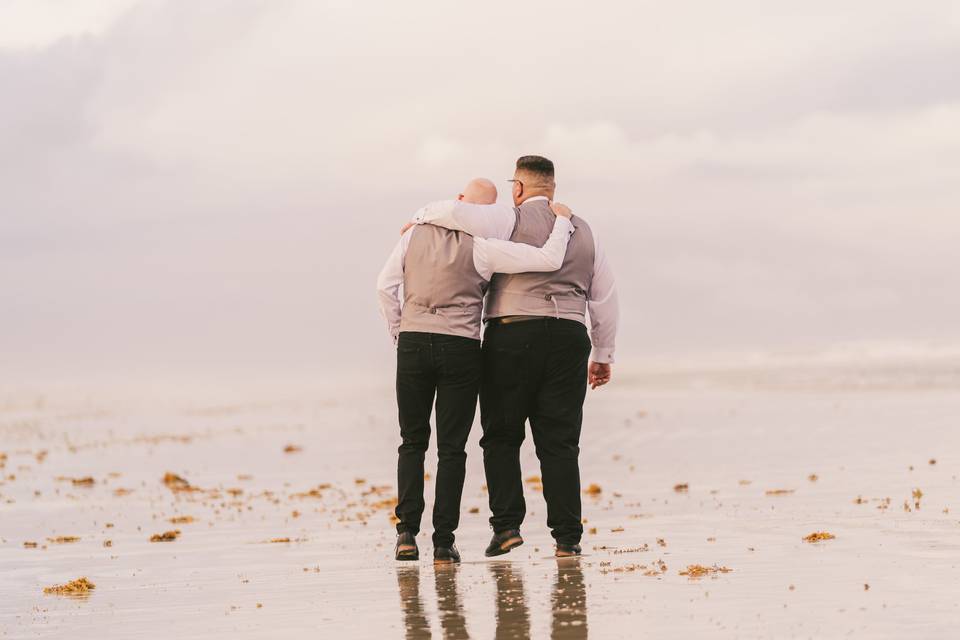 Grooms embrace