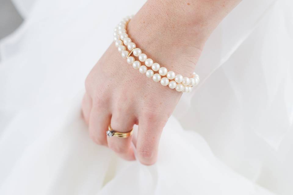 One of a kind handmade wedding bracelet comprised of reclaimed pearls, spacers, and clasp from vintage jewelry. As seen in Style Unvelied, Fall 2014.Findings: Gold plated, vintage.Handcrafted to order at our studio in Baltimore, MD, USA.