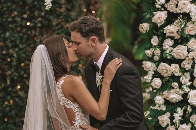 Bride and groom first kiss