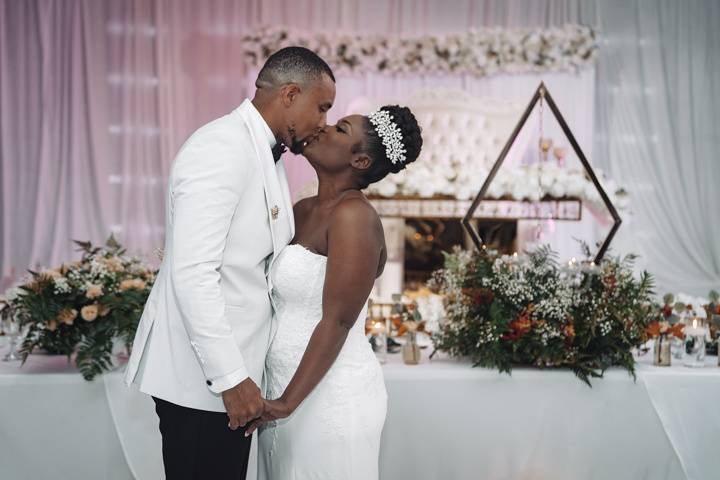 Bride and groom first kiss