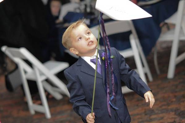 The children helped by announcing special moments during the reception.  They loved it!