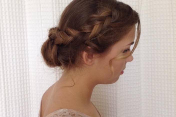One of the two bridesmaids - hair was put into a Gibson tuck in the back, with a Dutch braid on either side