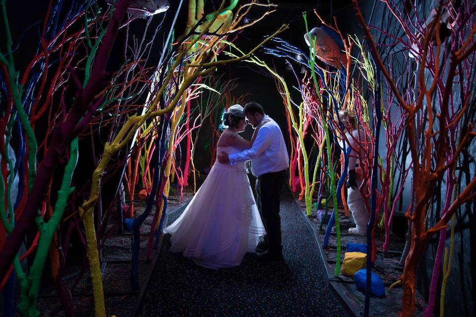 Couple kissing in a colorful garden