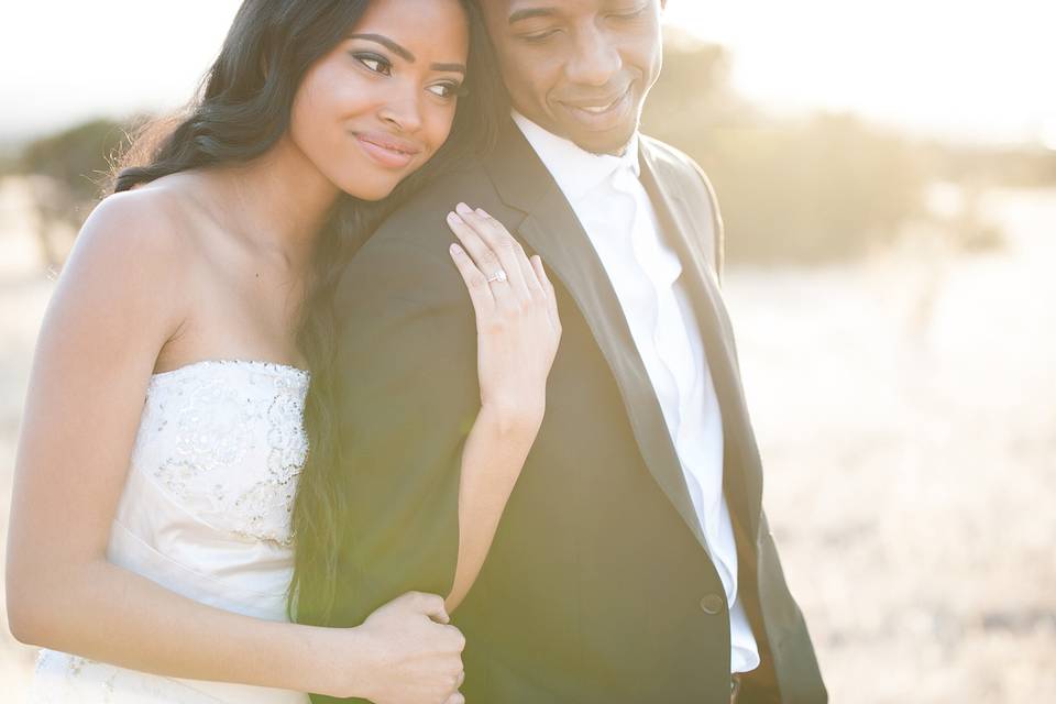 Couple embracing at sunset