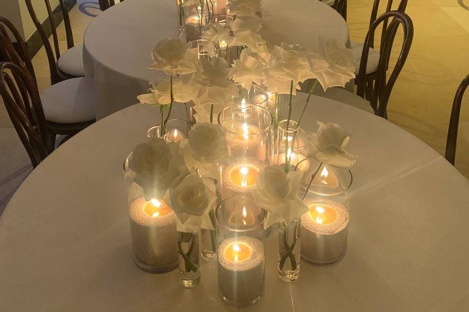 Candles and White Roses