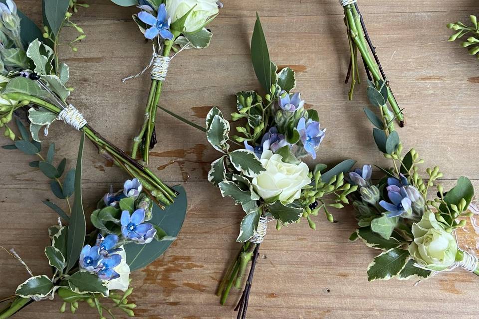 Blue boutonnieres