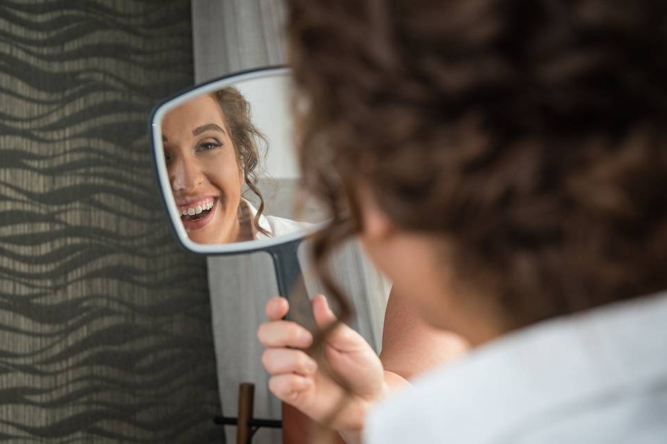 Bride checking her makeup