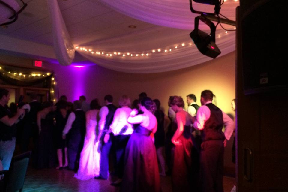 Guests dancing with the couple