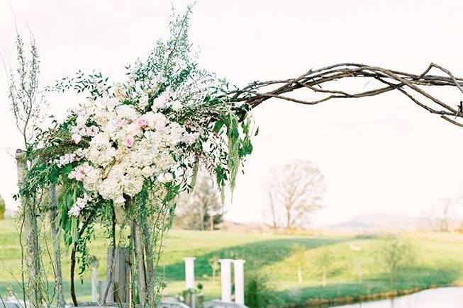 Wedding arch with white florals