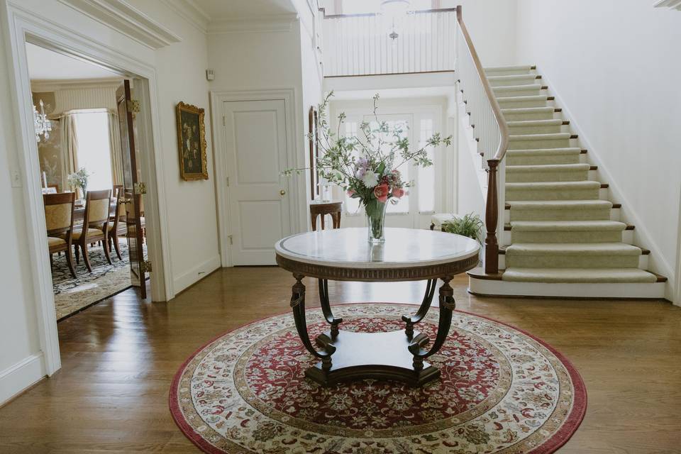 Main foyer featuring stairs