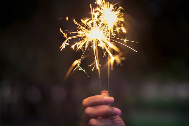 Sparklers in hand