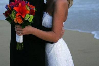 Bride and groom on beach