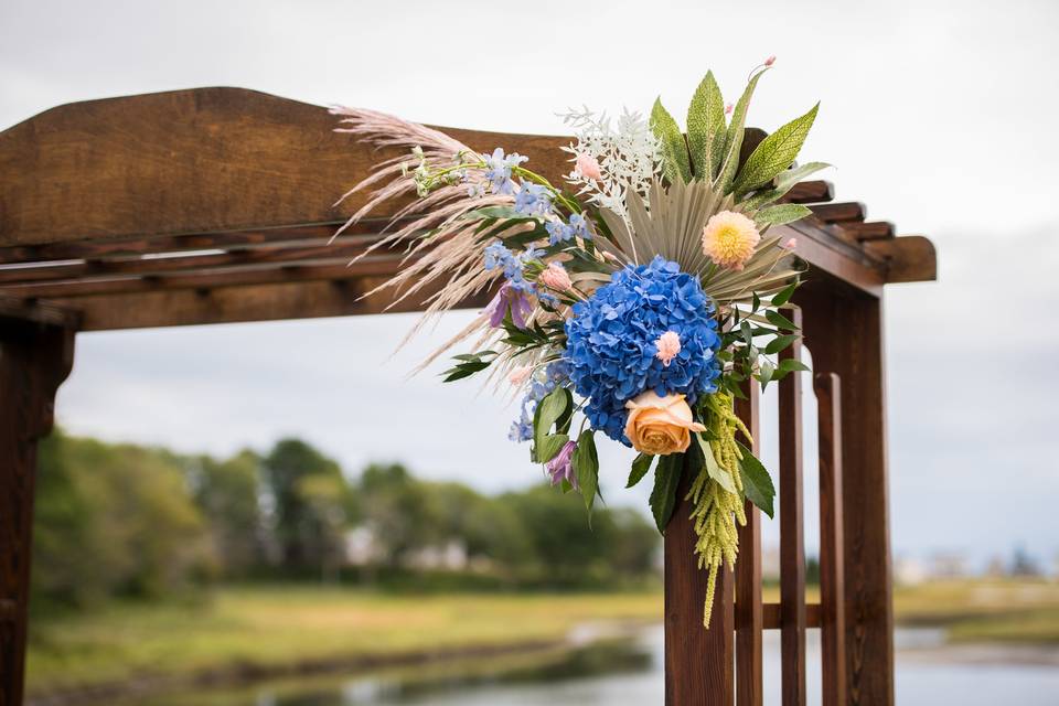 Wedding arch + flowers