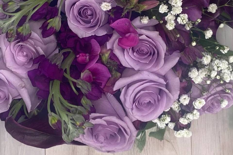 Lavender roses and calla lilie