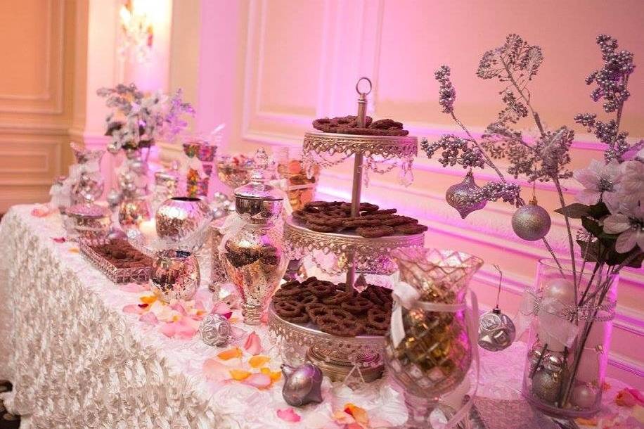 Full chocolate bar with the finest chocolate, dazzling crystals, vases and towers #weddingplanning #chocolate #weddingdecor #alexandriaweddingdecor #flowers