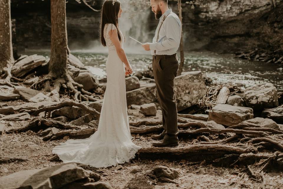 Couple by a waterfall